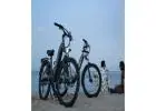 Cut Emissions and Costs: Switch to E-Bikes for City Travel!